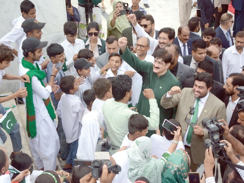 governor kamran tessori and cm murad ali shah join schoolchildren in a patriotic chant of pakistan zindabad at the mausoleum of quaid i azam muhammad ali jinnah photo jalal qureshi express