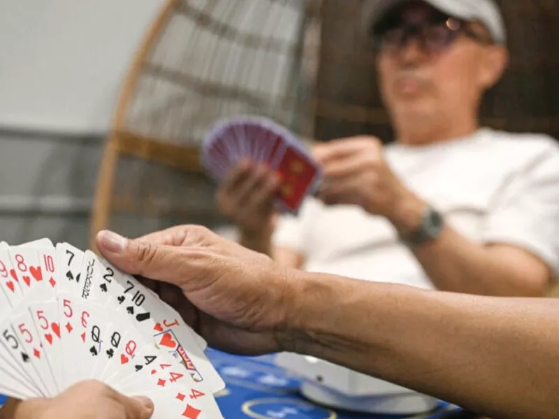 china s card game wins hearts despite official censure china s card game wins hearts despite official censure