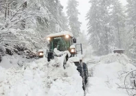 a snow removal machine clears two feet of snow from the shogran road making the route passable and safe once again photo express a snow removal machine clears two feet of snow from the shogran road making the route passable and safe once again photo express