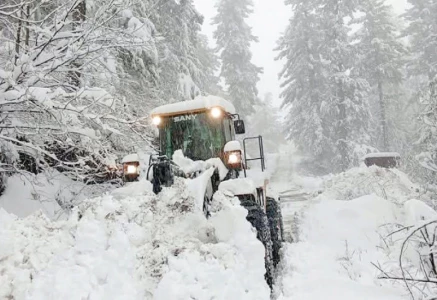 a snow removal machine clears two feet of snow from the shogran road making the route passable and safe once again photo express