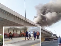 thick smoke billowing from a bus fire atop a 30 foot high elevated track was visible from murree road photos express