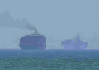 this screengrab from afptv footage shows cargo ships anchoring off the eastern coast of the united arab emirates at khor fakkan photo afp