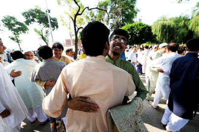 pakistanis celebrate eid with religious fervour