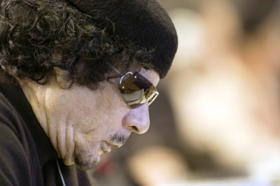 qaddafi says he will not surrender qaddafi says he will not surrender