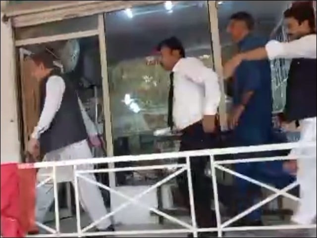 pti leaders shah mahmood qureshi asad umar flee court premises on june 20 photo screengrab express pti leaders shah mahmood qureshi asad umar flee court premises on june 20 photo screengrab express
