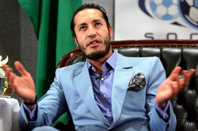 qaddafi son flees to niger fighting flares in libya qaddafi son flees to niger fighting flares in libya
