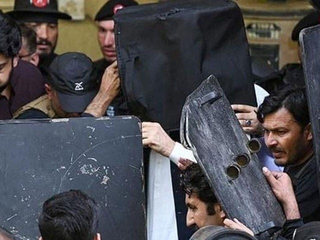 pti chairman appears in court under strict security in ecp contempt case photo express file
