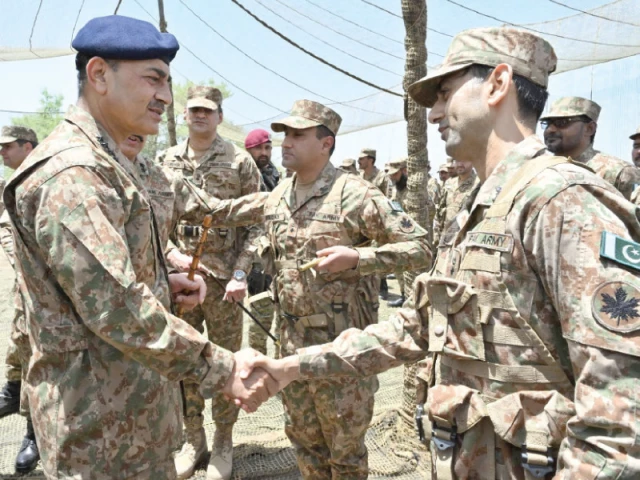 field marshal syed asim munir shakes hands with a soldier along the loc photo ispr field marshal syed asim munir shakes hands with a soldier along the loc photo ispr