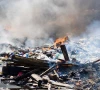 dispute over garbage burning claims life