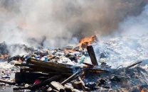 dispute over garbage burning claims life