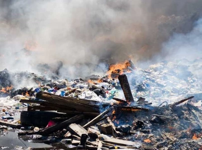 dispute over garbage burning claims life
