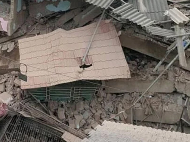 Woman dies in roof collapse