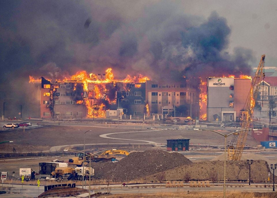 structures burn including an element hotel as a wind driven wildfire forced evacuation of the superior suburb of boulder colorado us december 30 2021 photo reuters