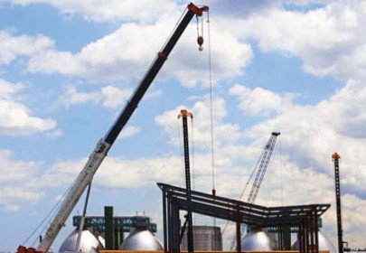 large scale manufacturing weak auto petroleum sectors keep growth low