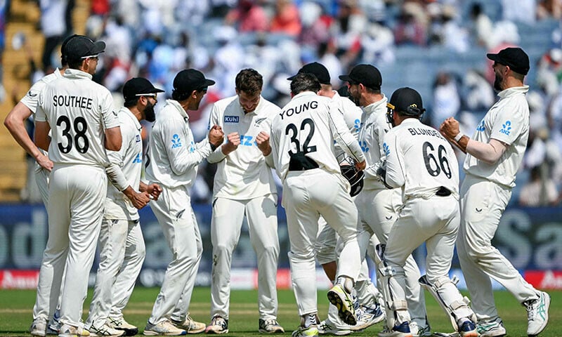 new zealand s players celebrate after the dismissal of india s virat kohli during the third day of the second test cricket match between india and new zealand at the maharashtra cricket association stadium in pune india on october 26 2024 photo afp