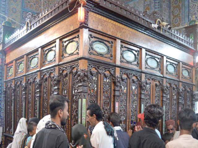 people pay respects at the shrine of shah abdul latif bhitai on the first day of the annual urs of the sufi saint at bhit shah in matiari district near hyderabad photo inp people pay respects at the shrine of shah abdul latif bhitai on the first day of the annual urs of the sufi saint at bhit shah in matiari district near hyderabad photo inp