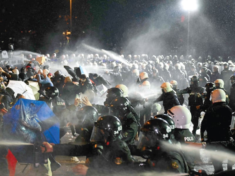 protesters clash with anti riot police during a rally in istanbul photo afp