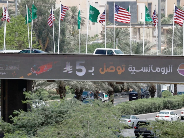 us and saudi arabia s flags flutter on major highways of riyadh ahead of the arrival of president donald trump photo reuters us and saudi arabia s flags flutter on major highways of riyadh ahead of the arrival of president donald trump photo reuters