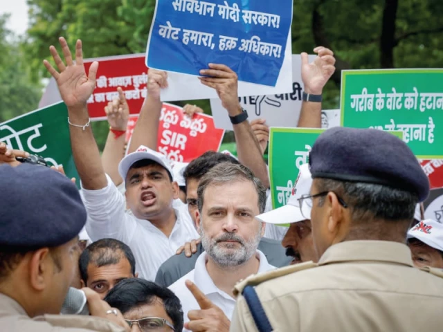 congress party leader rahul gandhi gestures as police stopped him along with other lawmakers during a protest in new delhi photo reuters