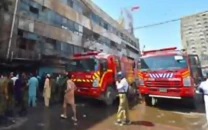 fire erupts in shopping centre parking area