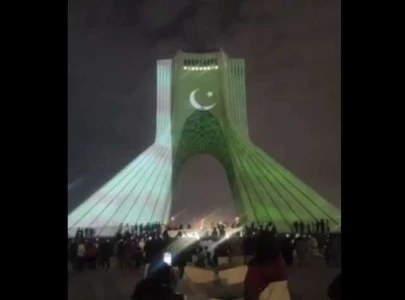national day iran s azadi tower dazzles with pakistani colours