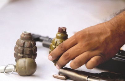 2 alleged militants arrested with a would be bomber 2 alleged militants arrested with a would be bomber