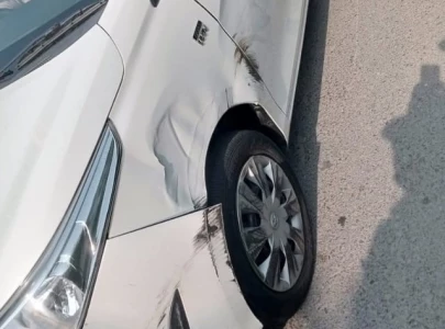 unknown vehicle crashes into atc judge s car in lahore