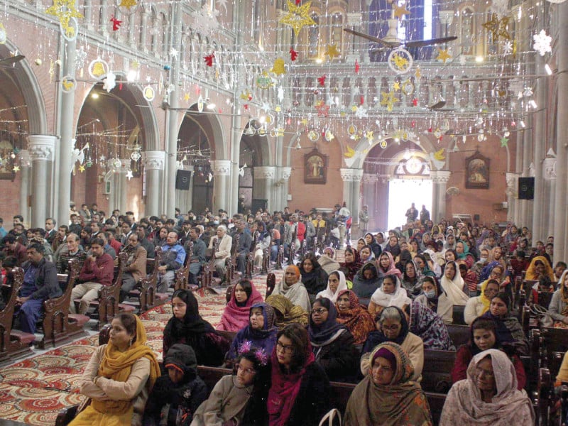 christian community members attend a christmas day gathering at st lawrence church in lahore the participants prayed for the safety and prosperity of the nation photo ppi