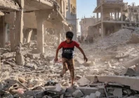 airstrike aftermath a boy walks through the rubble of a building that was destroyed following israeli bombardment at the maghazi refugee camp in the central gaza strip photo afp airstrike aftermath a boy walks through the rubble of a building that was destroyed following israeli bombardment at the maghazi refugee camp in the central gaza strip photo afp