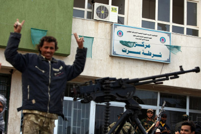 lybian rebels seize police building in gaddafi s last stronghold lybian rebels seize police building in gaddafi s last stronghold