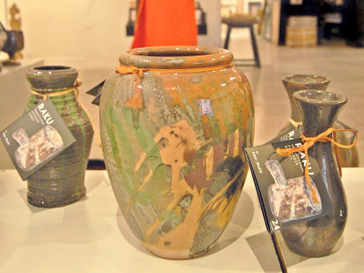 an unconventional duo of wood and ceramics open up to islamabad