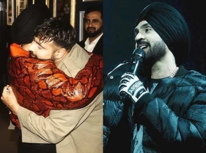 badshah makes surprise appearance at diljit dosanjh s london concert