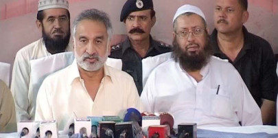 war of words mirza rubbishes blasphemy claim with mufti by his side war of words mirza rubbishes blasphemy claim with mufti by his side
