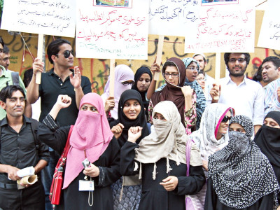 occupy wall street in karachi barely musters a pavement