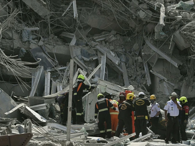 rescue teams are seen at a construction site where a building collapsed in bangkok on march 28 2025 after an earthquake a powerful earthquake rocked central myanmar on march 28 buckling roads in capital naypyidaw damaging buildings and forcing people to flee into the streets in neighbouring thailand photo afp rescue teams are seen at a construction site where a building collapsed in bangkok on march 28 2025 after an earthquake a powerful earthquake rocked central myanmar on march 28 buckling roads in capital naypyidaw damaging buildings and forcing people to flee into the streets in neighbouring thailand photo afp