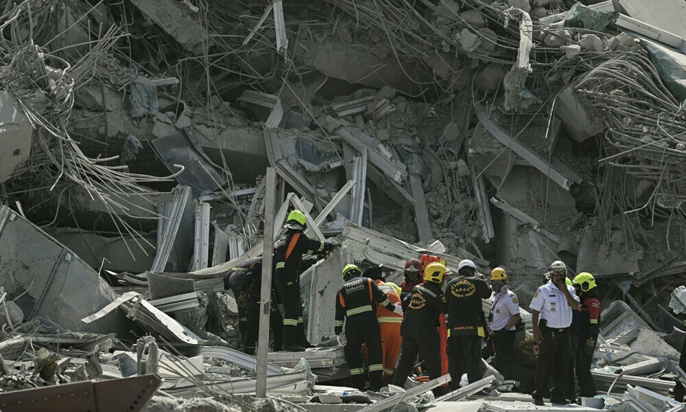 rescue teams are seen at a construction site where a building collapsed in bangkok on march 28 2025 after an earthquake a powerful earthquake rocked central myanmar on march 28 buckling roads in capital naypyidaw damaging buildings and forcing people to flee into the streets in neighbouring thailand photo afp rescue teams are seen at a construction site where a building collapsed in bangkok on march 28 2025 after an earthquake a powerful earthquake rocked central myanmar on march 28 buckling roads in capital naypyidaw damaging buildings and forcing people to flee into the streets in neighbouring thailand photo afp