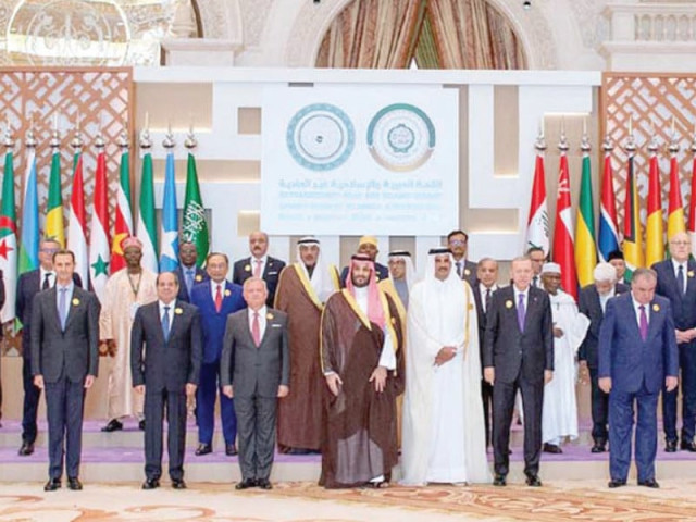 arab and muslim leaders pose for a group photograph at the arab islamic extraordinary summit photo ppi arab and muslim leaders pose for a group photograph at the arab islamic extraordinary summit photo ppi