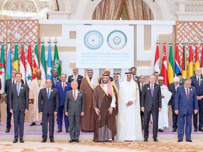 arab and muslim leaders pose for a group photograph at the arab islamic extraordinary summit photo ppi