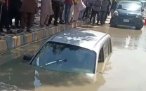 car sinks into road collapse women rescued