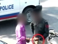 motorcycle police squad collects eidi at checkpoint