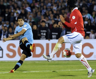 suarez scores four to destroy chile