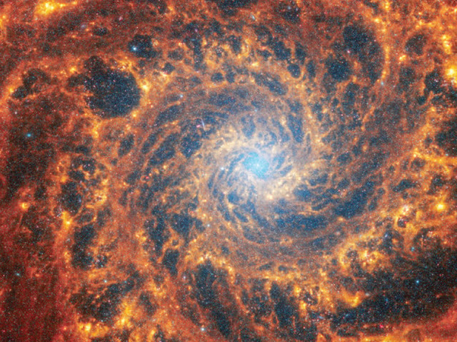 this file photo shows spiral galaxy ngc 628 located 32 million light years away from earth in an undated image from the james webb space telescope photo reuters this file photo shows spiral galaxy ngc 628 located 32 million light years away from earth in an undated image from the james webb space telescope photo reuters