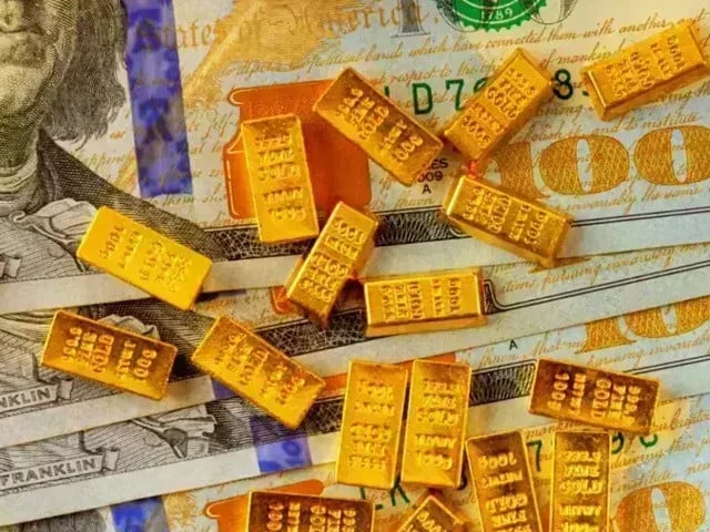 Gold steady in range as global pressure persists