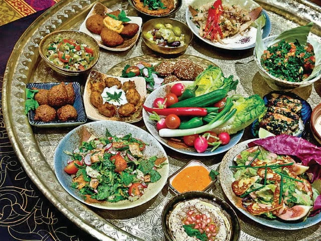 traditional dishes displayed at the festival included the flavourful tajine harira couscous pastilla refreshing moroccan mint tea and the sweetly spiced kaab el ghazal photo file traditional dishes displayed at the festival included the flavourful tajine harira couscous pastilla refreshing moroccan mint tea and the sweetly spiced kaab el ghazal photo file