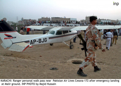 engine trouble cessna plane makes emergency landing in malir park