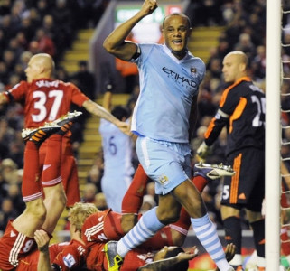 football ten man city hold onto premier league lead