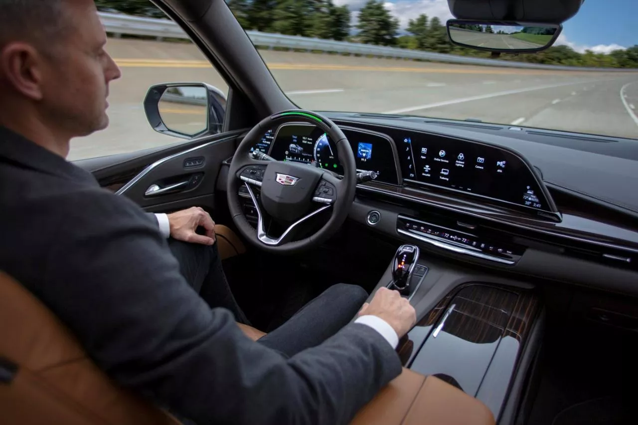 a gm test driver sits in a 2021 cadillac escalade suv with general motors super cruise hands free driving assistance in this undated handout picture general motors photo reuters a gm test driver sits in a 2021 cadillac escalade suv with general motors super cruise hands free driving assistance in this undated handout picture general motors photo reuters