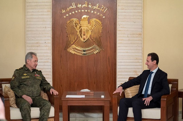 Syria's President Bashar al-Assad meets with Russian Defence Minister Sergei Shoigu in Damascus, Syria, in this handout released by SANA on February 15, 2022. PHOTO: REUTERS