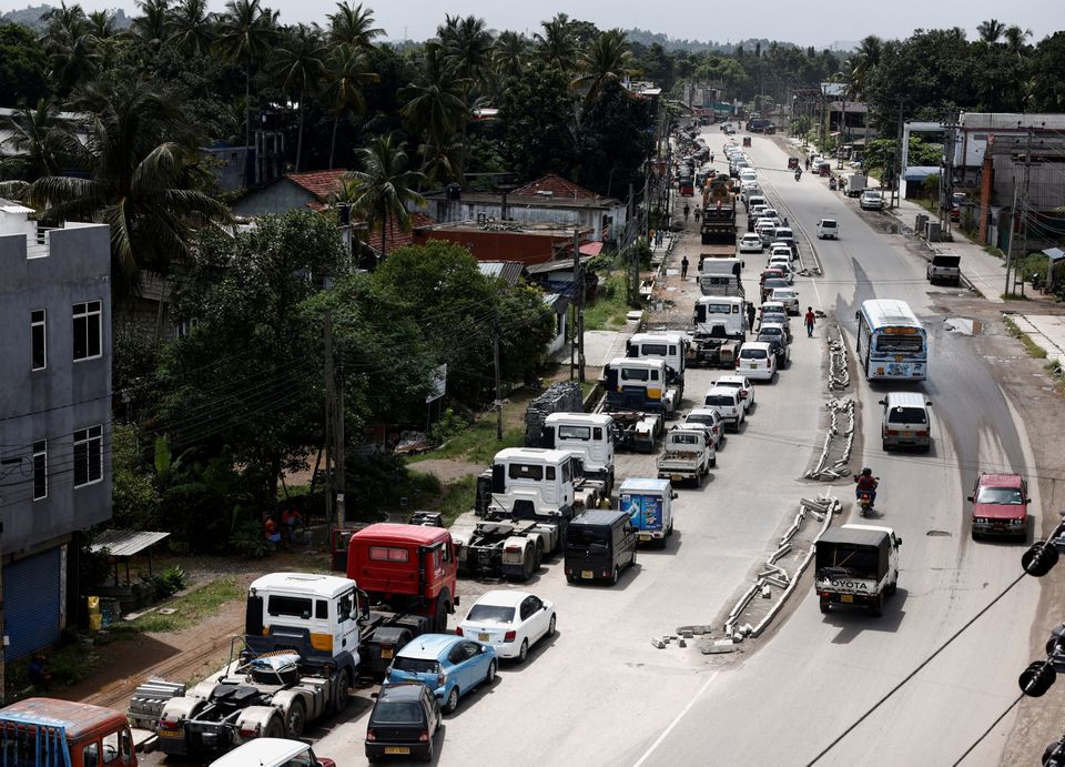 vehicles queue for diesel and petrol as they wait for a bowser since yesterday amid the country s economic crisis in colombo sri lanka june 23 2022 reuters