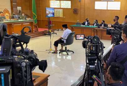 indonesian court sentences teacher to death for raping 13 students